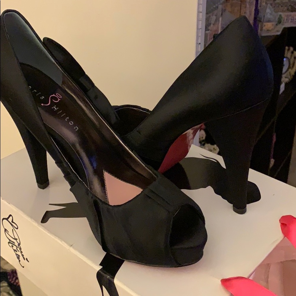 Black Paris Hilton heels with side bow.